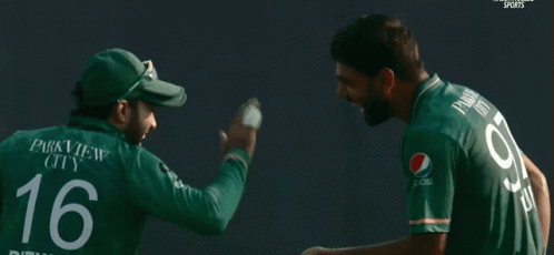 A Man Wearing A Green Jersey With The Number 97 On It GIF