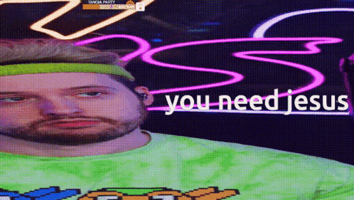 A Man Wearing A Green Shirt And A Green Headband Says You Need Jesus GIF