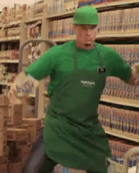 A Man Wearing A Green Shirt And Green Apron With The Word Porter On It GIF