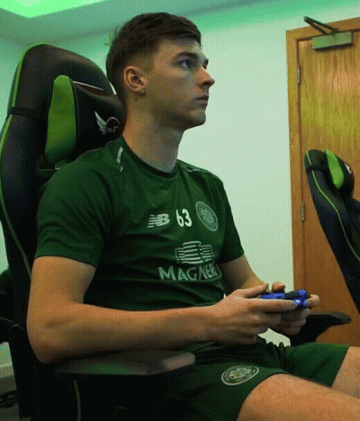 A Man Wearing A Green Shirt That Has The Number 63 On It GIF