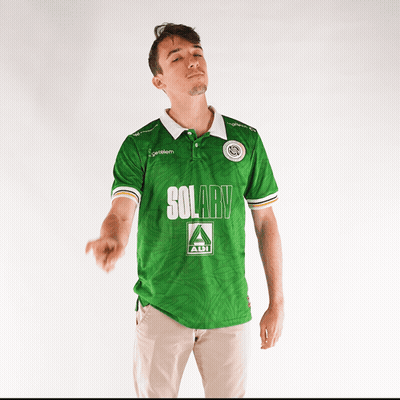 A Man Wearing A Green Shirt That Says Solary On It GIF