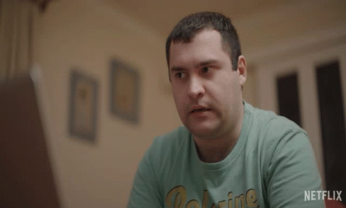A Man Wearing A Green Shirt With The Word Yes Written On It GIF
