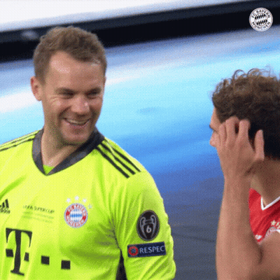 A Man Wearing A Green T-Mobile Jersey Is Smiling GIF