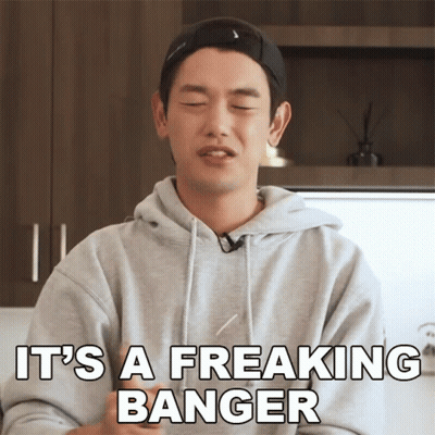 A Man Wearing A Grey Hoodie And A Black Hat Says It 'S A Freaking Banger GIF