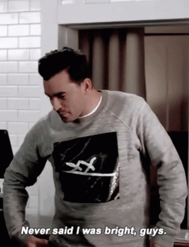 A Man Wearing A Grey Sweatshirt Says Never Said I Was Bright Guys GIF