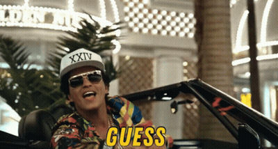 A Man Wearing A Guess Hat And Sunglasses Is In A Convertible GIF