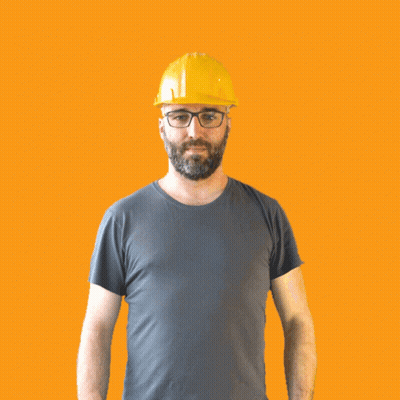 A Man Wearing A Hard Hat And Glasses Is Making A Thumbs Down Sign GIF