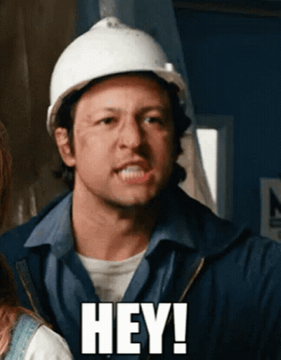 A Man Wearing A Hard Hat Says " Hey " GIF