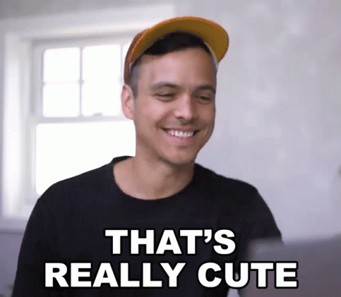 A Man Wearing A Hat And A Black Shirt Says That 'S Really Cute GIF