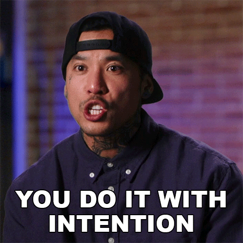 A Man Wearing A Hat And A Blue Shirt Says You Do It With Intention GIF
