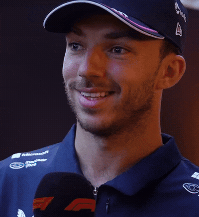 A Man Wearing A Hat And A Blue Shirt With The Word Ahh On It GIF