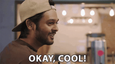 A Man Wearing A Hat And A Brown Shirt Says Okay Cool GIF