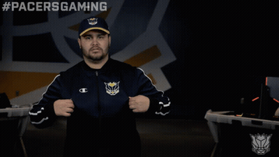 A Man Wearing A Hat And A Jacket With #Pacersgaming Written Above Him GIF