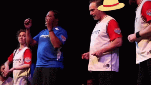 A Man Wearing A Hat And A Jersey That Says ' United States ' On The Front GIF