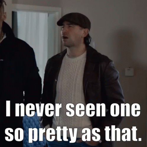 A Man Wearing A Hat And A Leather Jacket Says I Never Seen One So Pretty As That GIF