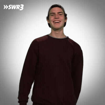 A Man Wearing A Hat And A Maroon Sweater With Swr3 In The Corner GIF