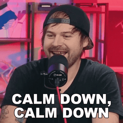 A Man Wearing A Hat And A Microphone Says Calm Down GIF