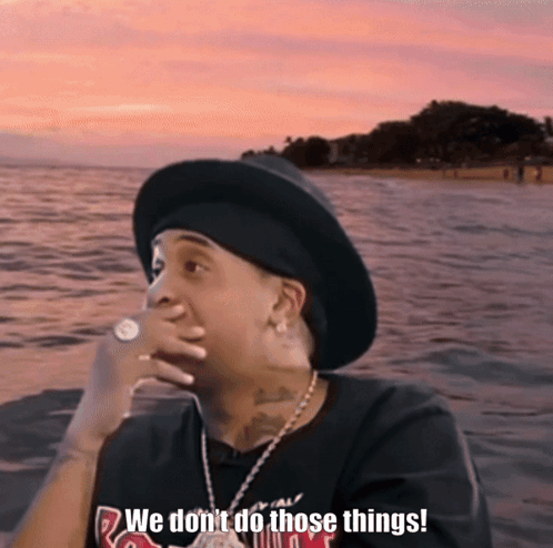 A Man Wearing A Hat And A Necklace Says " We Do N't Do Those Things " GIF