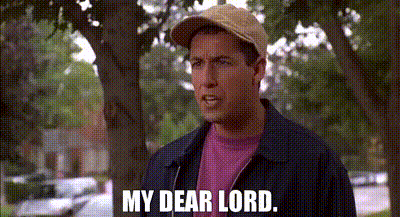 A Man Wearing A Hat And A Pink Shirt Is Standing In Front Of Trees And Says My Dear Lord . GIF