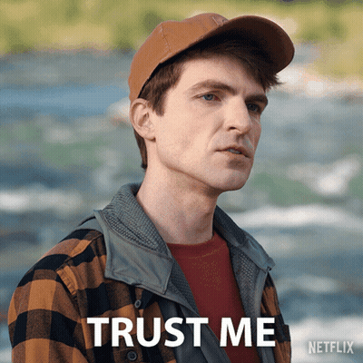 A Man Wearing A Hat And A Plaid Shirt Says Trust Me On A Netflix Poster GIF