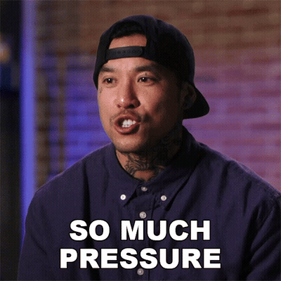 A Man Wearing A Hat And A Purple Shirt Says " So Much Pressure " GIF