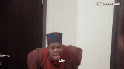 A Man Wearing A Hat And A Red Vest Is Making A Funny Face And Saying Lily . GIF