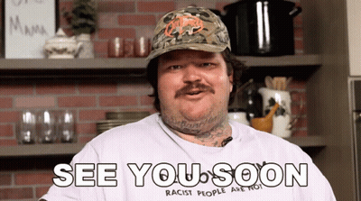 A Man Wearing A Hat And A Shirt That Says " See You Soon " GIF