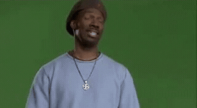 A Man Wearing A Hat And A Sweater With The Word Wrong On It . GIF