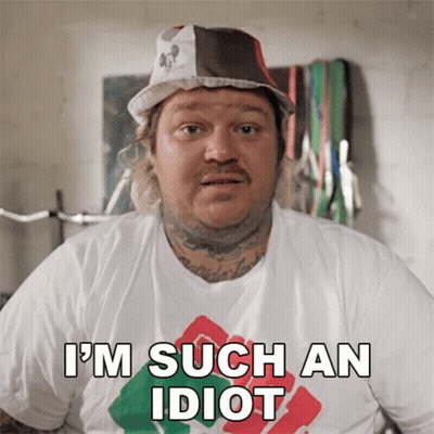A Man Wearing A Hat And A T-Shirt Says I 'M Such An Idiot GIF