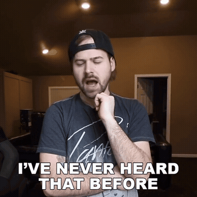A Man Wearing A Hat And A T-Shirt That Says " I 'Ve Never Heard That Before " GIF