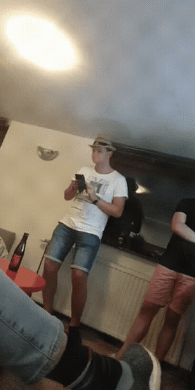 A Man Wearing A Hat And A T-Shirt That Says ' Y ' On It GIF