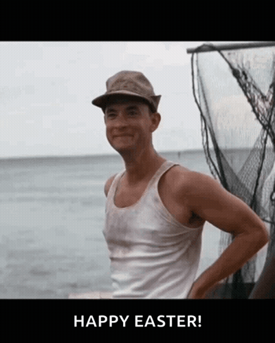 A Man Wearing A Hat And A Tank Top Is Standing In Front Of A Body Of Water And Says Happy Easter GIF