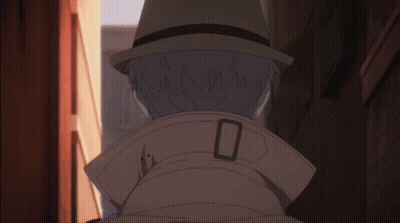 A Man Wearing A Hat And A Trench Coat Has The Number 0 On The Collar GIF