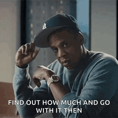 A Man Wearing A Hat And A Watch Says Find Out How Much And Go With It Then .. GIF