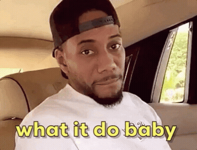 A Man Wearing A Hat And A White Shirt Is Sitting In A Car . GIF