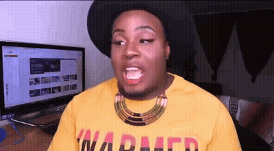 a man wearing a hat and a yellow shirt with the word warped on it .
