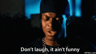 A Man Wearing A Hat And Chains Is Saying " Do N't Laugh It Ain 'T Funny " GIF