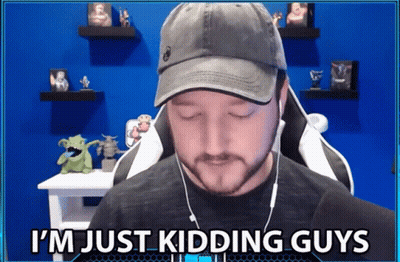 A Man Wearing A Hat And Ear Buds Says I 'M Just Kidding Guys GIF