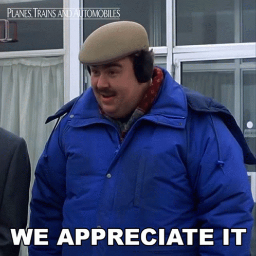 A Man Wearing A Hat And Ear Muffs Says " We Appreciate It " GIF
