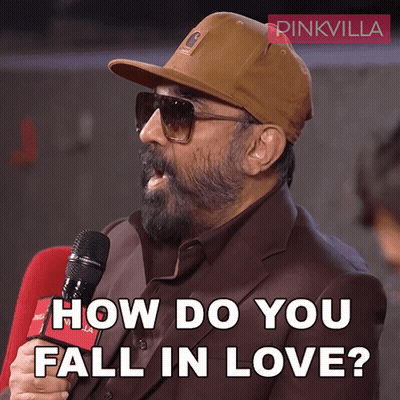 A Man Wearing A Hat And Sunglasses Is Holding A Microphone And Asking How Do You Fall In Love GIF