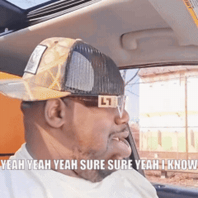 A Man Wearing A Hat And Sunglasses Says " Yeah Yeah Yeah Sure Sure Yeah I Know " GIF