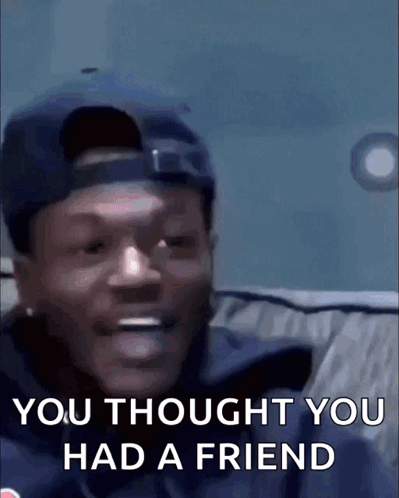 A Man Wearing A Hat Is Sitting On A Couch And Says You Thought You Had A Friend . GIF