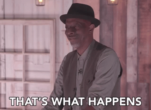 A Man Wearing A Hat Is Standing In Front Of A Sign That Says " That 'S What Happens " GIF