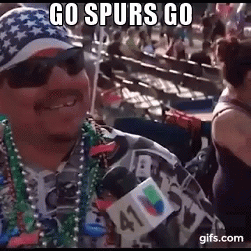 A Man Wearing A Hat , Sunglasses , Beads And A Microphone With The Words `` Go Spurs Go '' On It GIF
