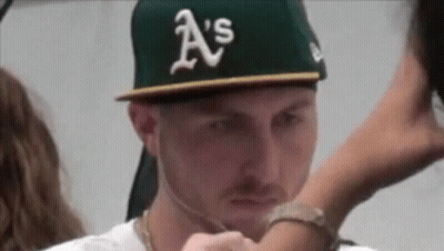 A Man Wearing A Hat That Says A 'S On It . GIF