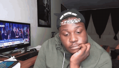 A Man Wearing A Hat That Says " And You 'Re Not " GIF