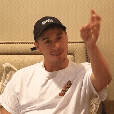 A Man Wearing A Hat That Says Big Dog Gotta Go On It GIF