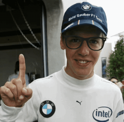 A Man Wearing A Hat That Says Bmw Sauber F1 Team On It GIF