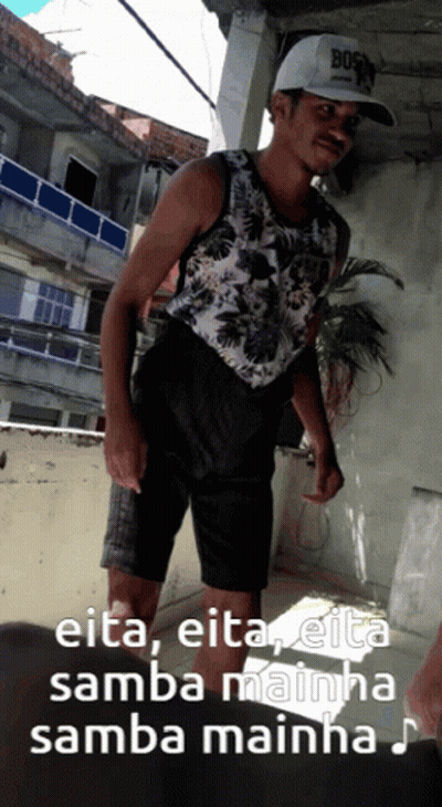 A Man Wearing A Hat That Says Bos On It GIF