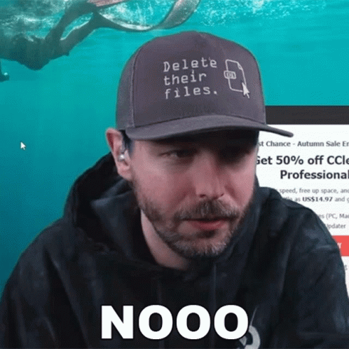 A Man Wearing A Hat That Says " Delete Their Files " GIF